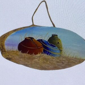 Oval Wall Art with Colorful Pottery Design